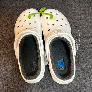 Brand new never used Crocs size 10. Warm and comfortable.